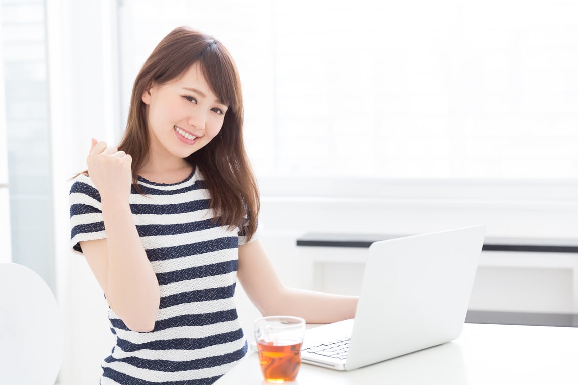 Japanese woman using a PC